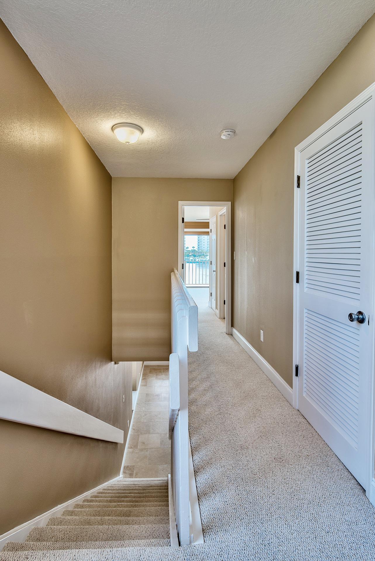 28 Moreno Point Road, Unit E Destin, FL 32541 - Photo 27 of 54 Hallway between bedrooms