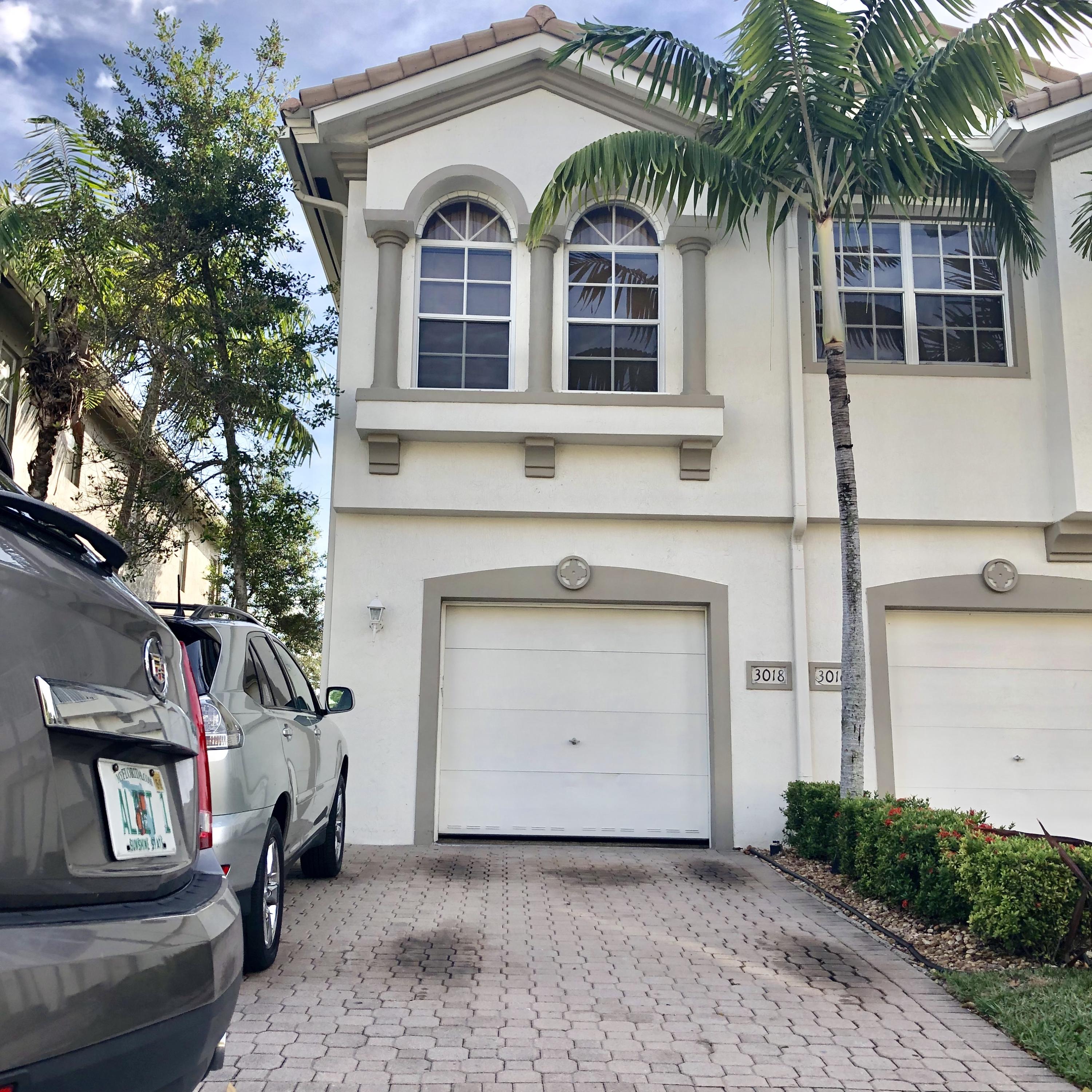 3018 Laurel Ridge Circle Riviera Beach, FL 33404 - Photo 2 of 25 FRONT VIEW