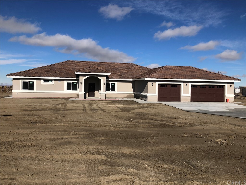 2840 Sequoia Road Phelan, CA 92371 - Photo 1 of 1 a front view of a house with a yard