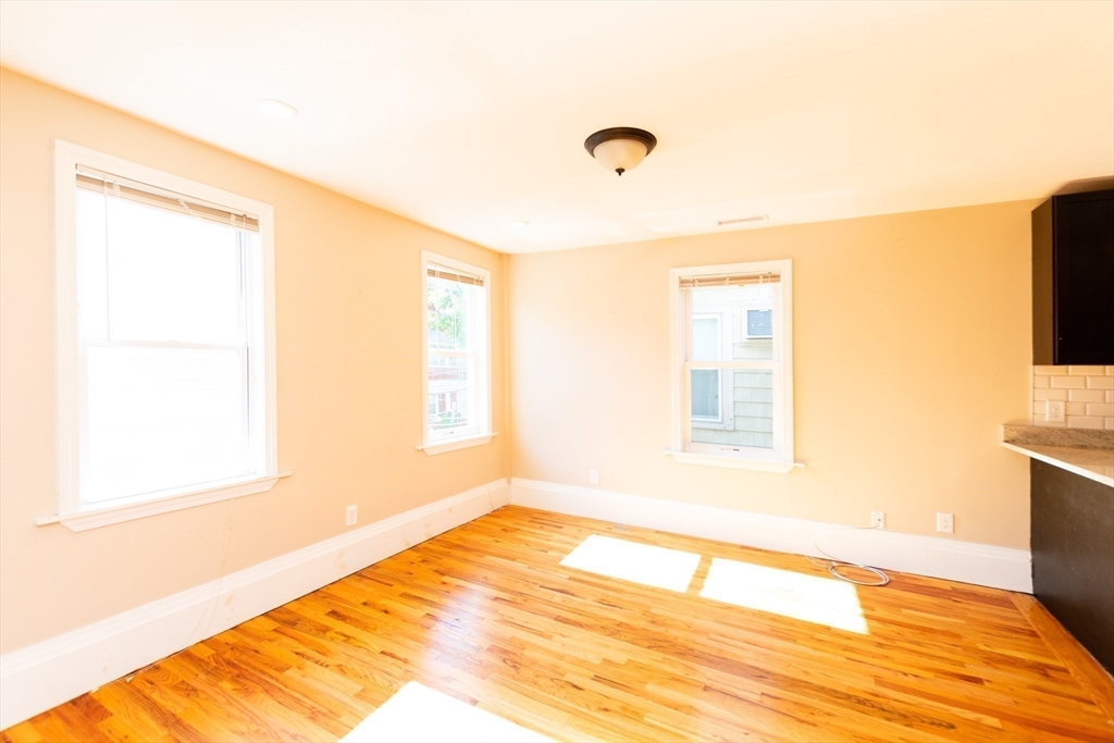 27 Shannon Street, Unit 2L Boston, MA 02135 - Photo 7 of 22 a view of an empty room with a window