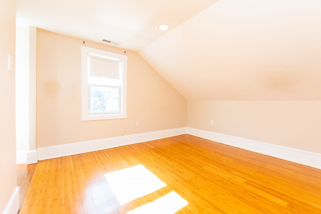 27 Shannon Street, Unit 2L Boston, MA 02135 - Photo 9 of 22 a view of an empty room with a window