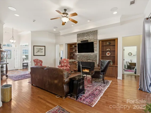 a bedroom with a bed couch and window