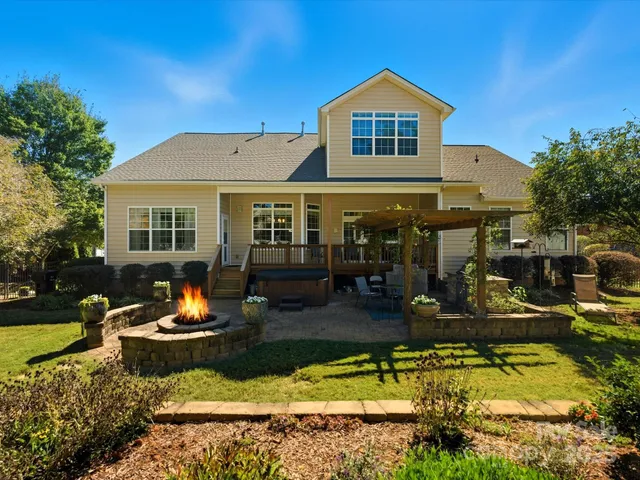 a view of a yard with swimming pool