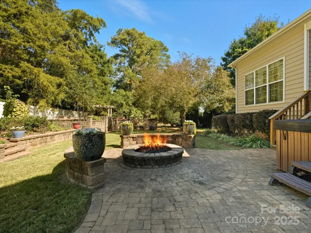 a view of a swimming pool with a patio