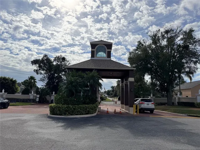 a large bathroom with a sink a large mirror and vanity