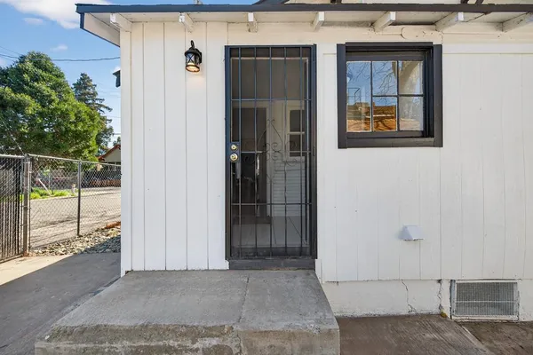 front view of a house with a glass door
