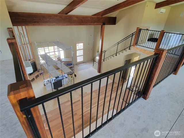 a view of living room with furniture and a window