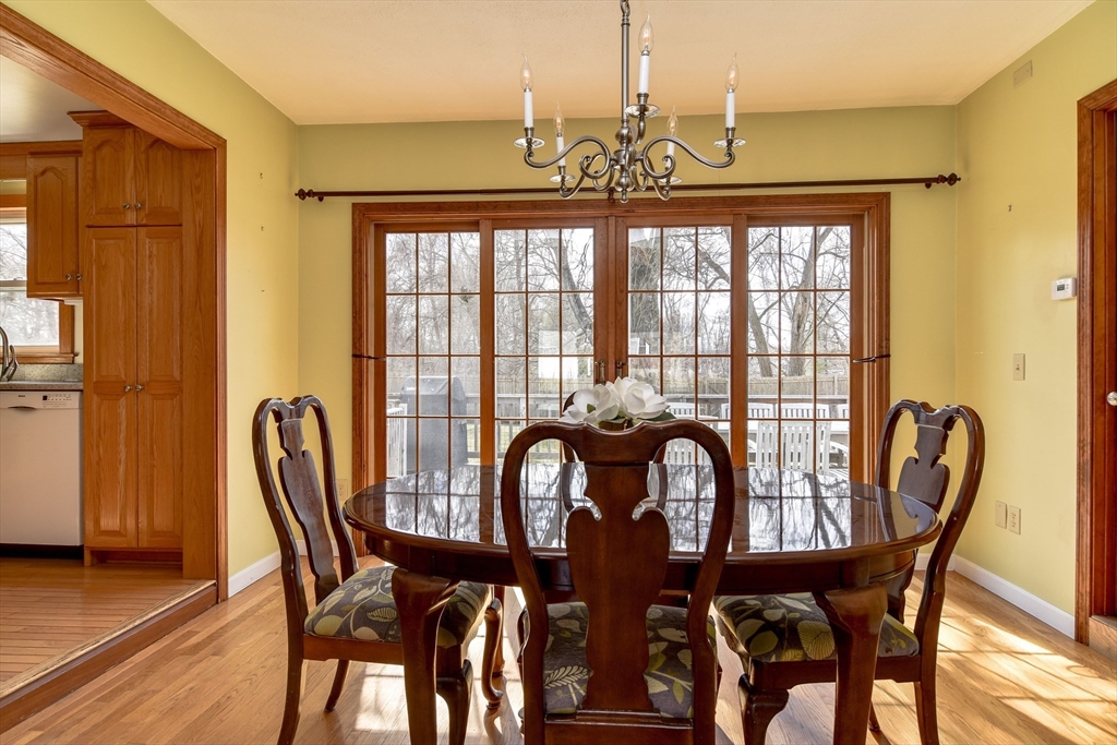 8 Edwards Road Natick, MA 01760 - Photo 4 of 29 a view of a dining room with furniture and chandelier