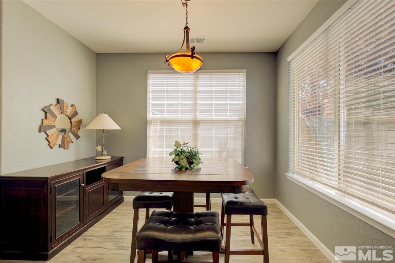 10482 Gold Trail Drive Reno, NV 89521 - Photo 5 of 40 a view of a dining room with furniture and window