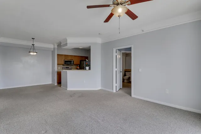 a view of a kitchen with a sink and dishwasher