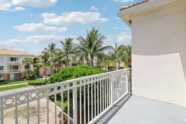 a view of a city with a building in the background