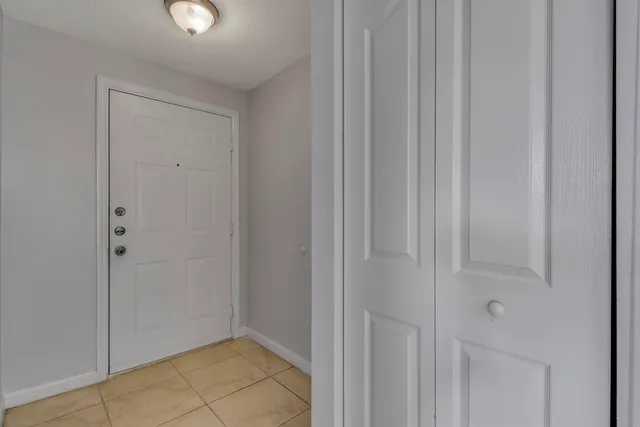 a kitchen with stainless steel appliances granite countertop a sink dishwasher stove top oven and refrigerator