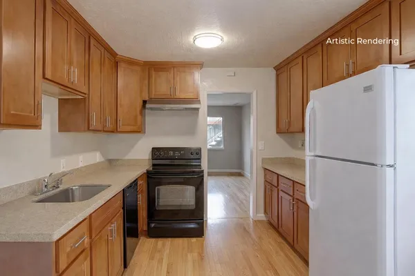 a kitchen with a refrigerator sink and stove