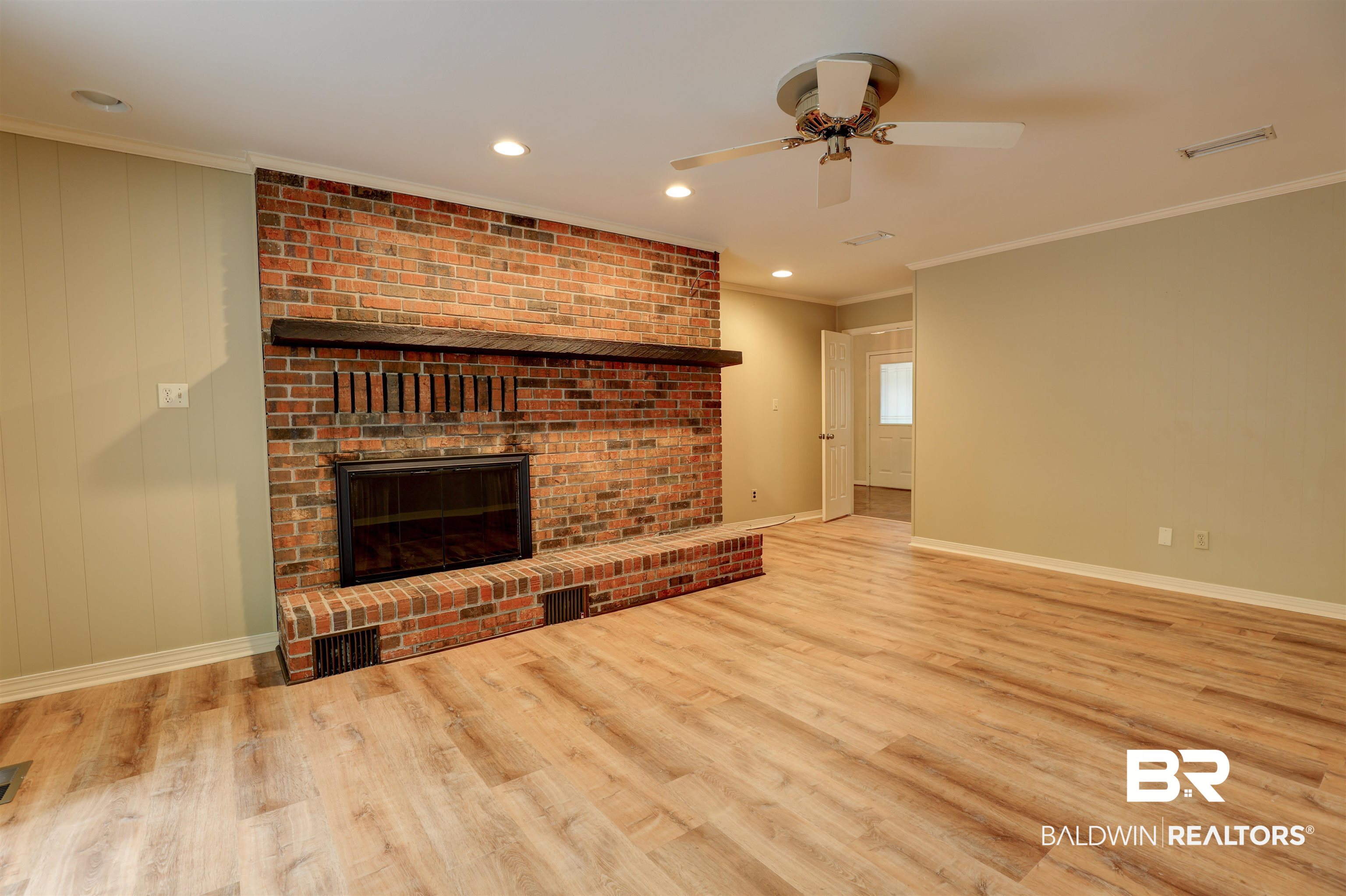 7323 Wild Oaks Road Fairhope, AL 36532 - Photo 9 of 45 Den with Fireplace
