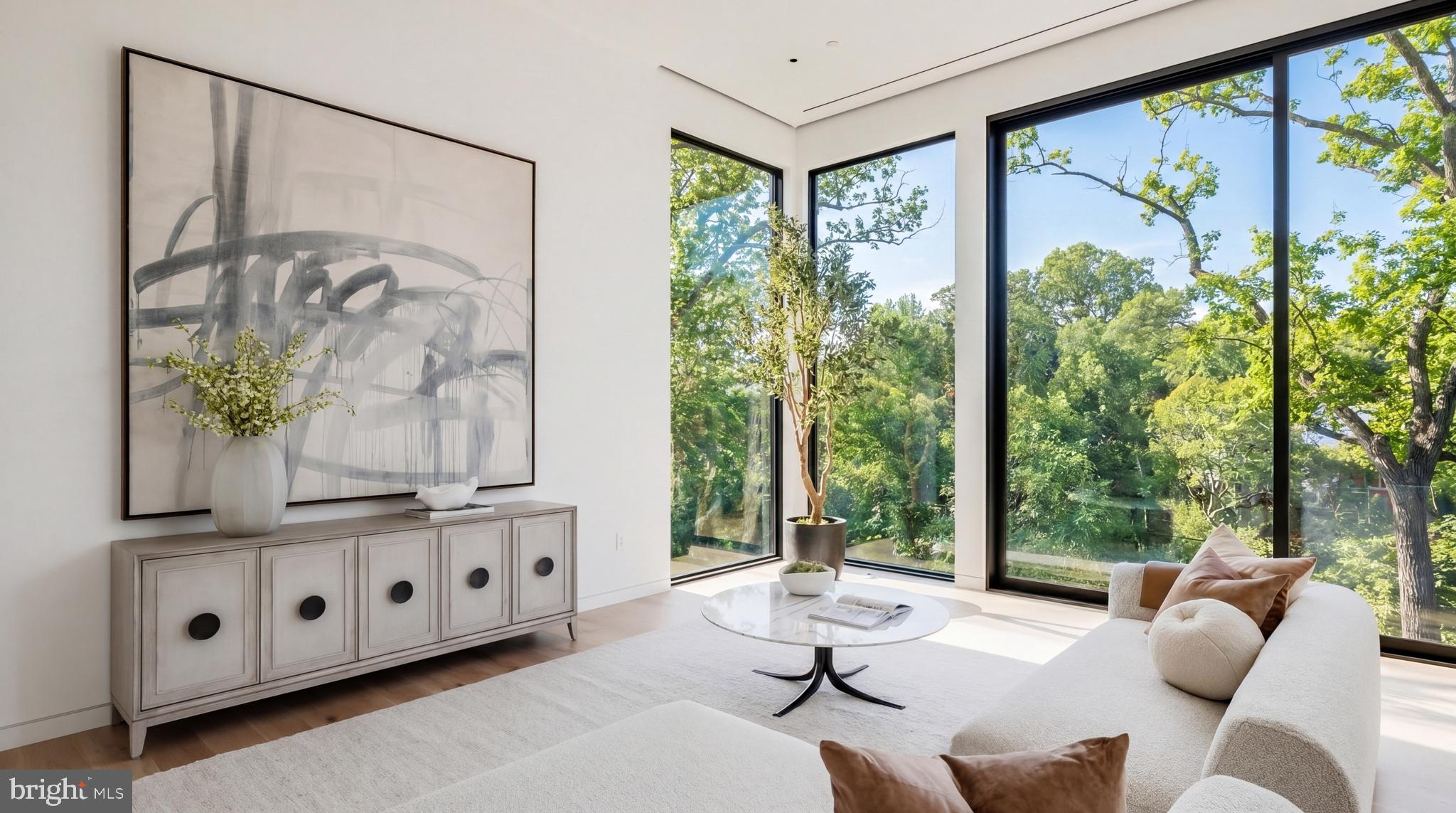 2676 Chain Bridge Road Northwest Washington, DC 20016 - Photo 16 of 50 Light-Filled Family Room with Wooded Views