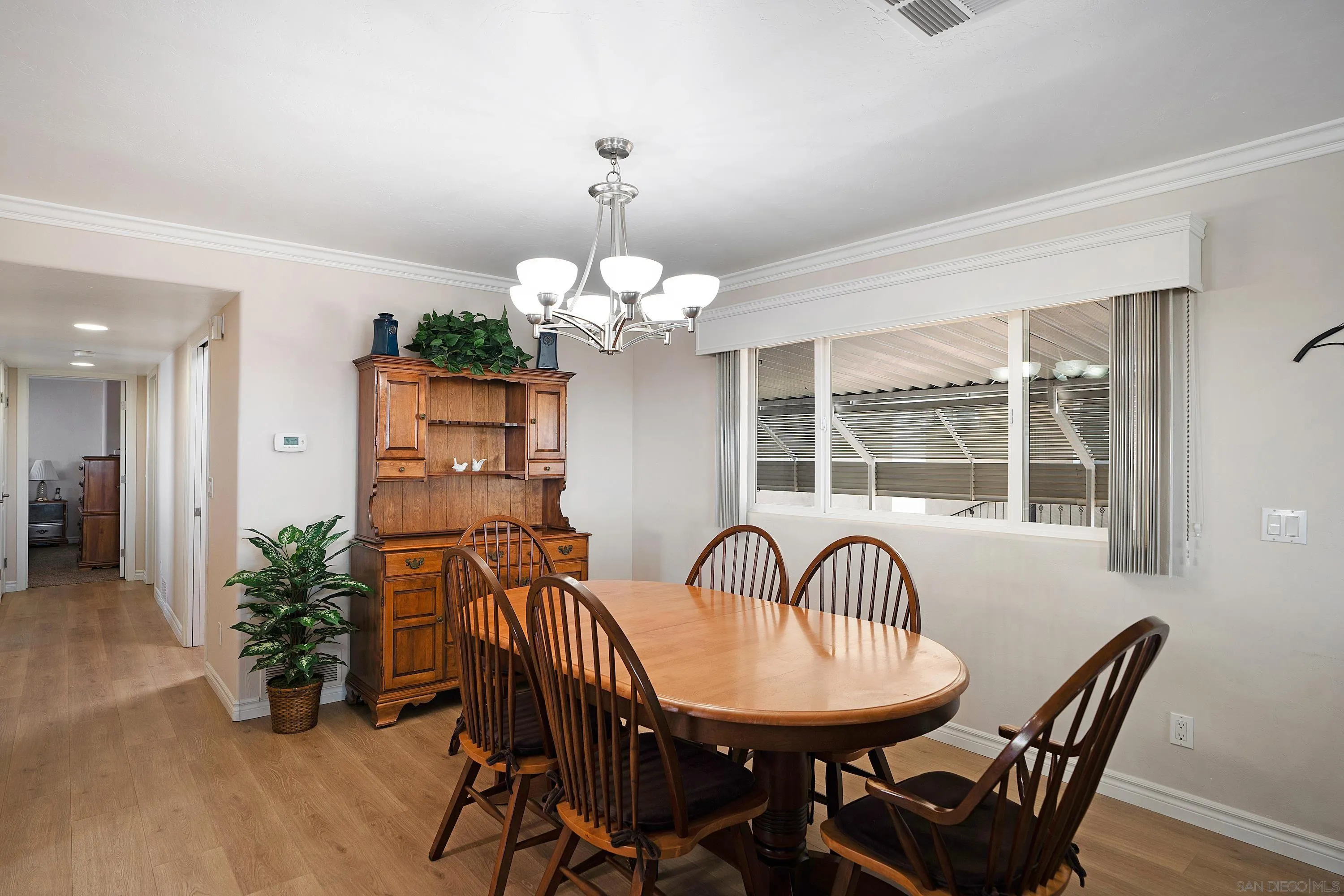 9500 Harritt Road, Unit 234 Lakeside, CA 92040 - Photo 12 of 29 a view of a dining room with furniture and chandelier