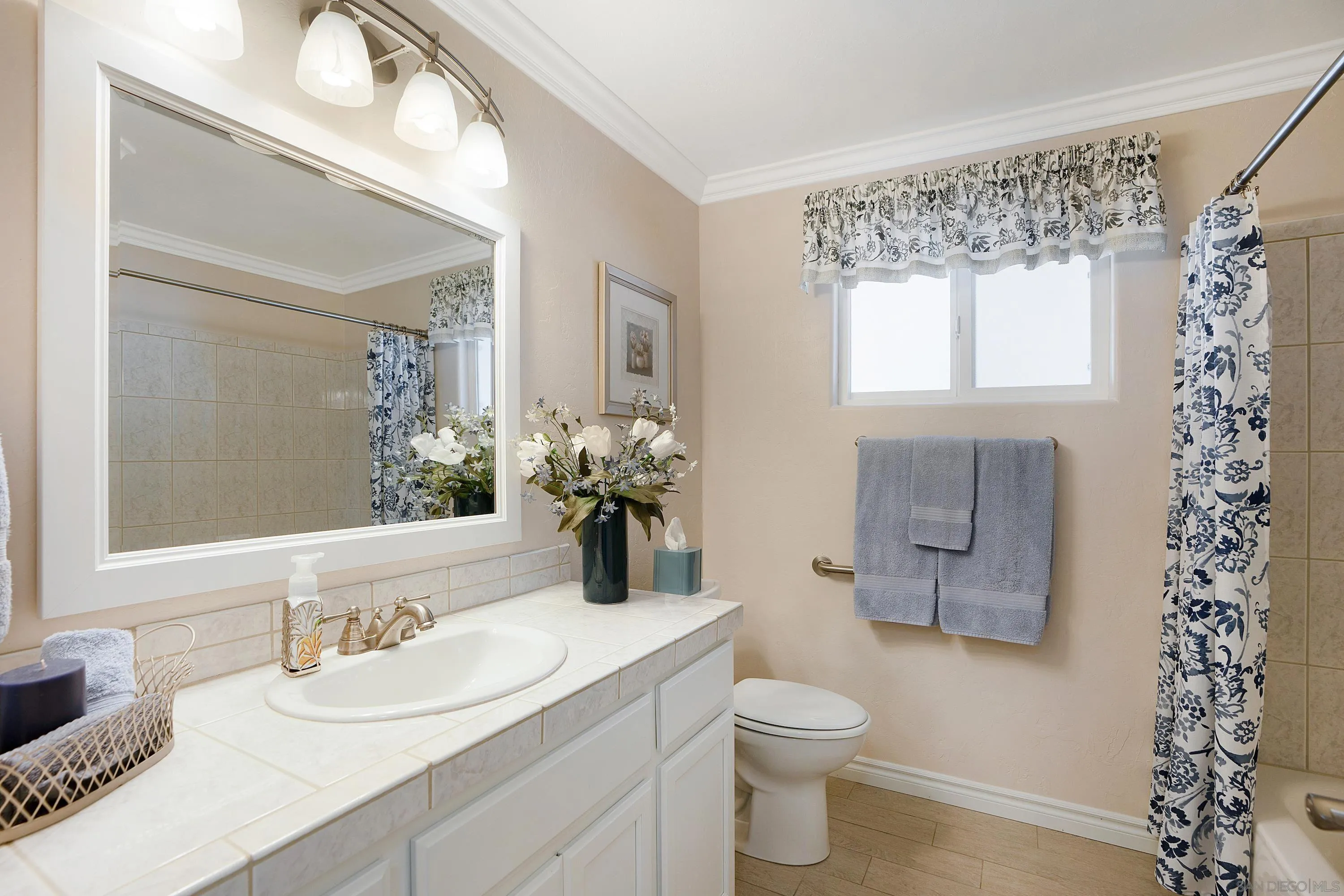 9500 Harritt Road, Unit 234 Lakeside, CA 92040 - Photo 13 of 29 a bathroom with a granite countertop sink toilet and mirror