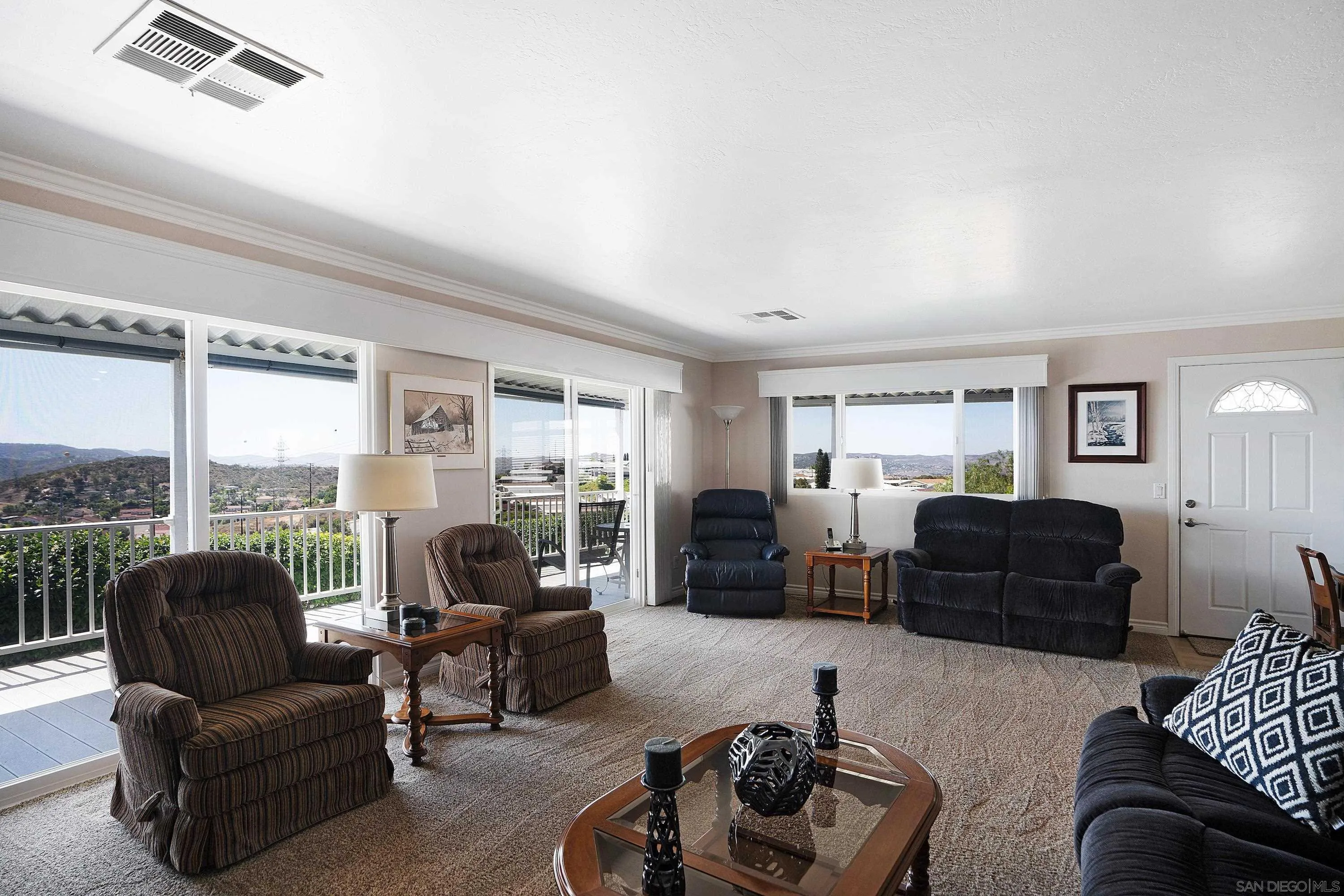9500 Harritt Road, Unit 234 Lakeside, CA 92040 - Photo 6 of 29 a living room with furniture and a large window