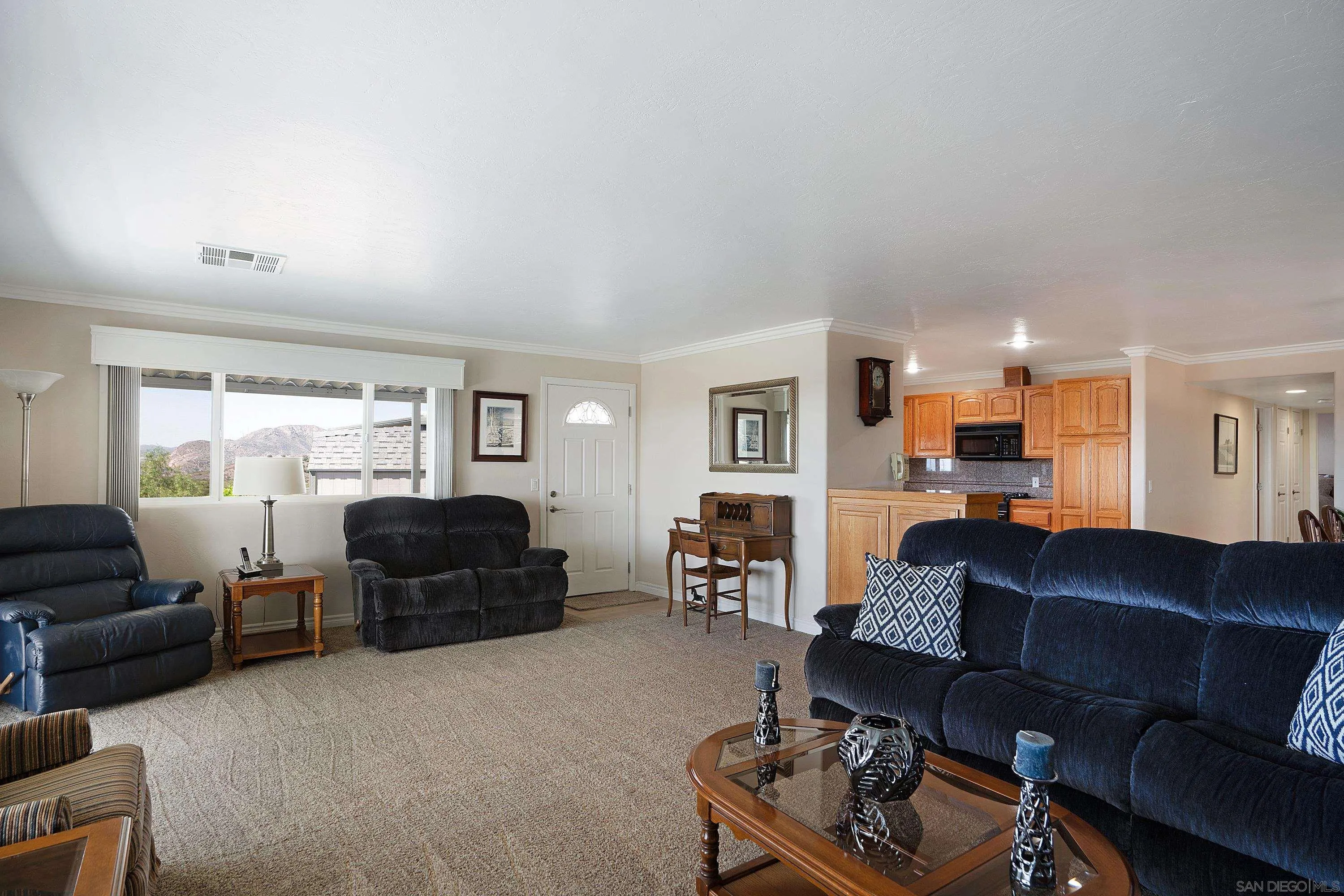 9500 Harritt Road, Unit 234 Lakeside, CA 92040 - Photo 7 of 29 a living room with furniture and a couch
