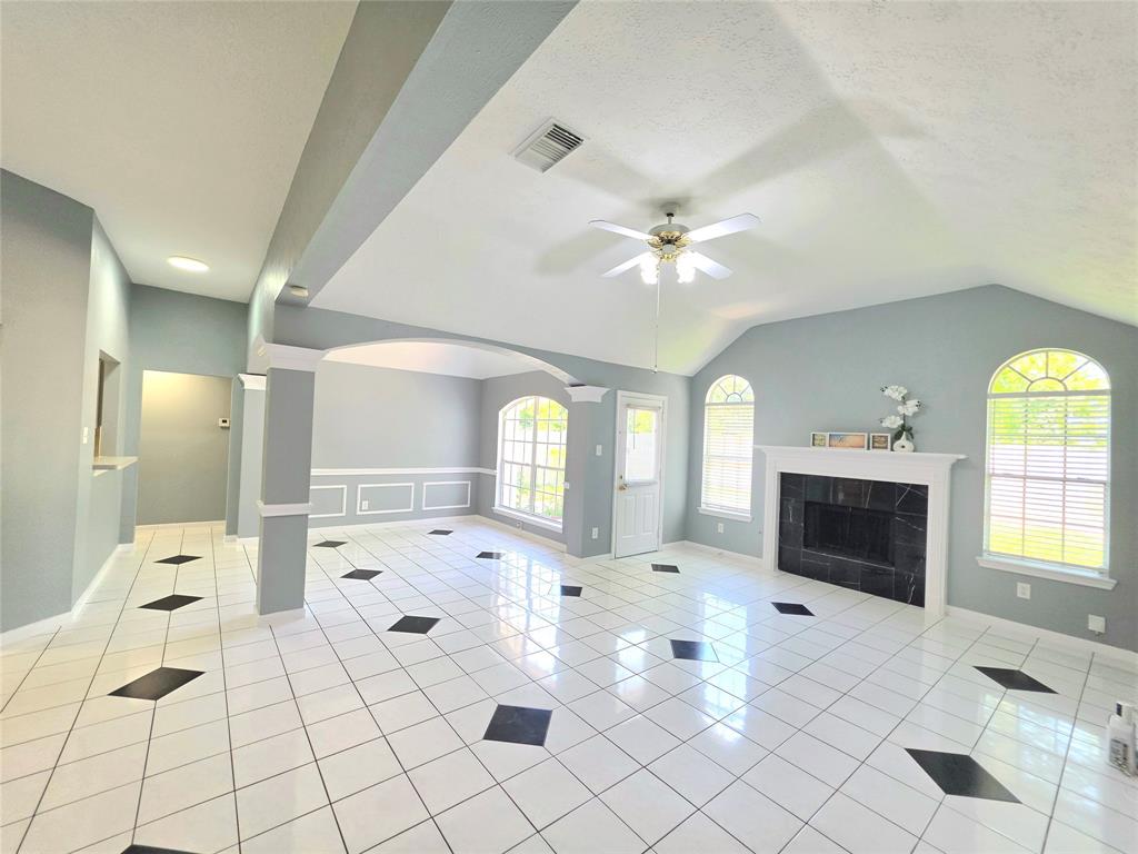13618 Sablegrove Lane Houston, TX 77014 - Photo 1 of 30 a view of a livingroom with a fireplace