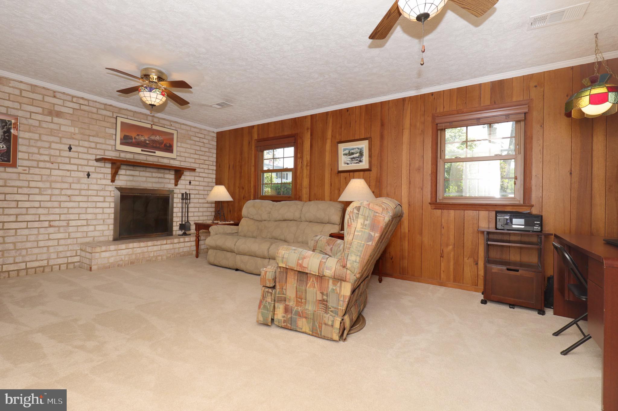 6706 Red Jacket Road Springfield, VA 22152 - Photo 29 of 48 Family Room with Wood Fireplace on Lower Level 1