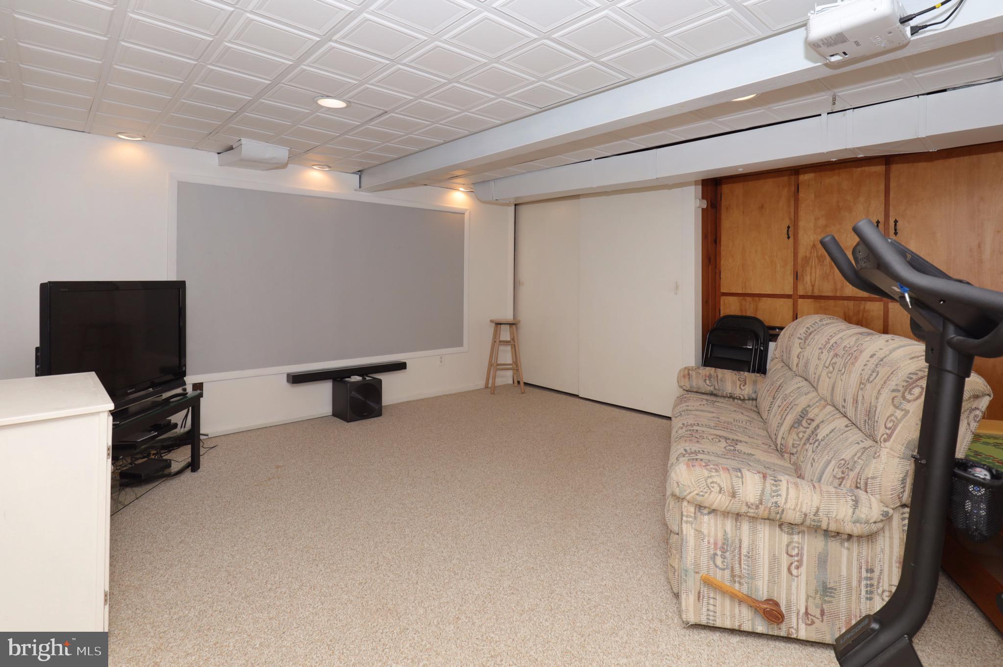 6706 Red Jacket Road Springfield, VA 22152 - Photo 38 of 48 Rec Room comes with a Home Theater System!