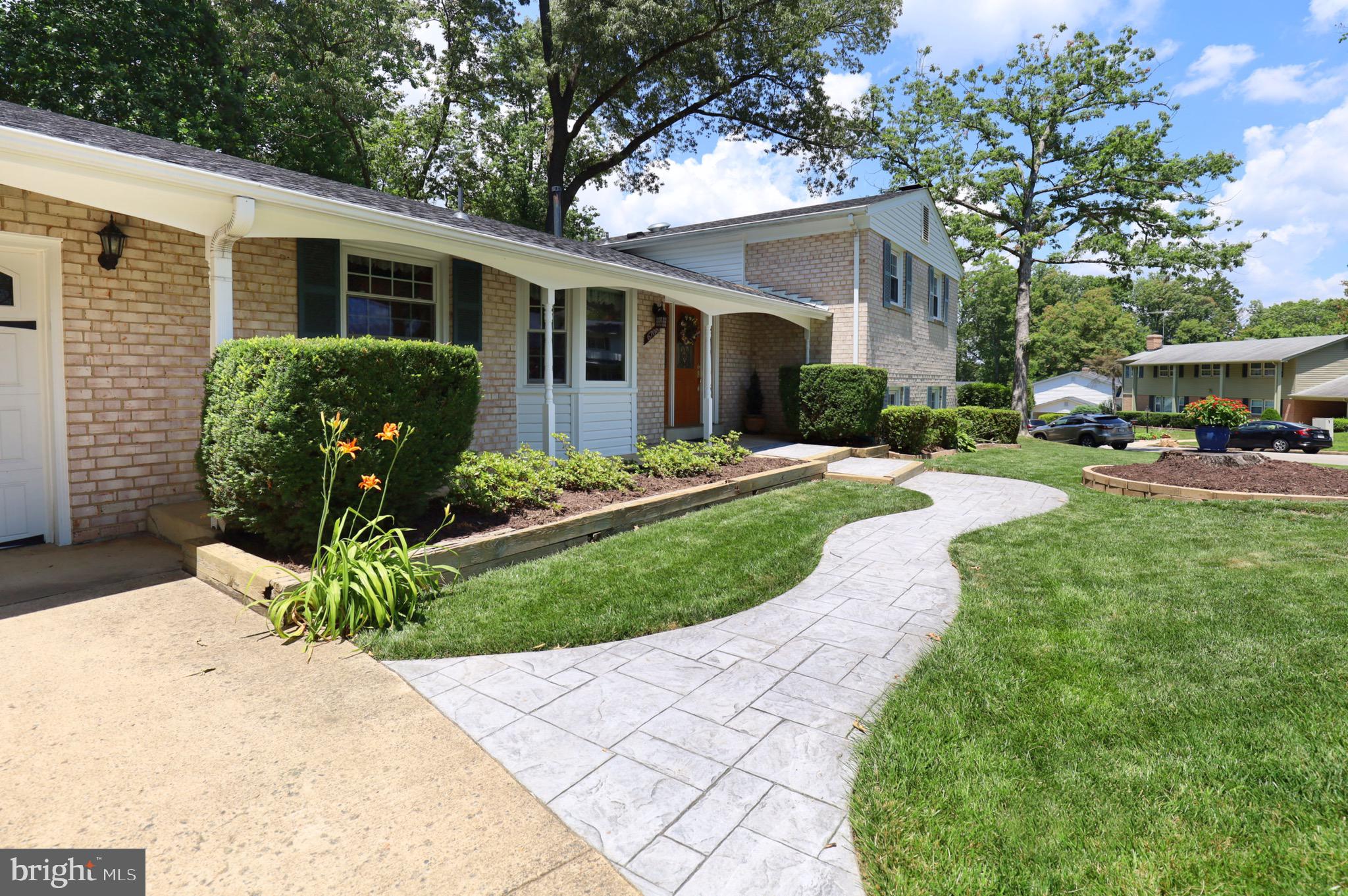 6706 Red Jacket Road Springfield, VA 22152 - Photo 5 of 48 Beautiful Landscaping and Stamped Sidewalk
