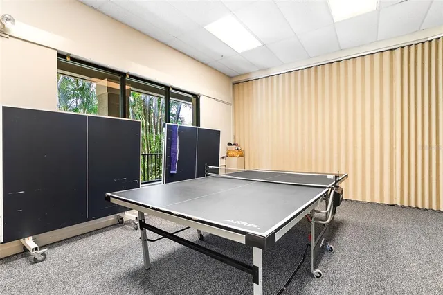 a view of yard with swimming pool and sitting area