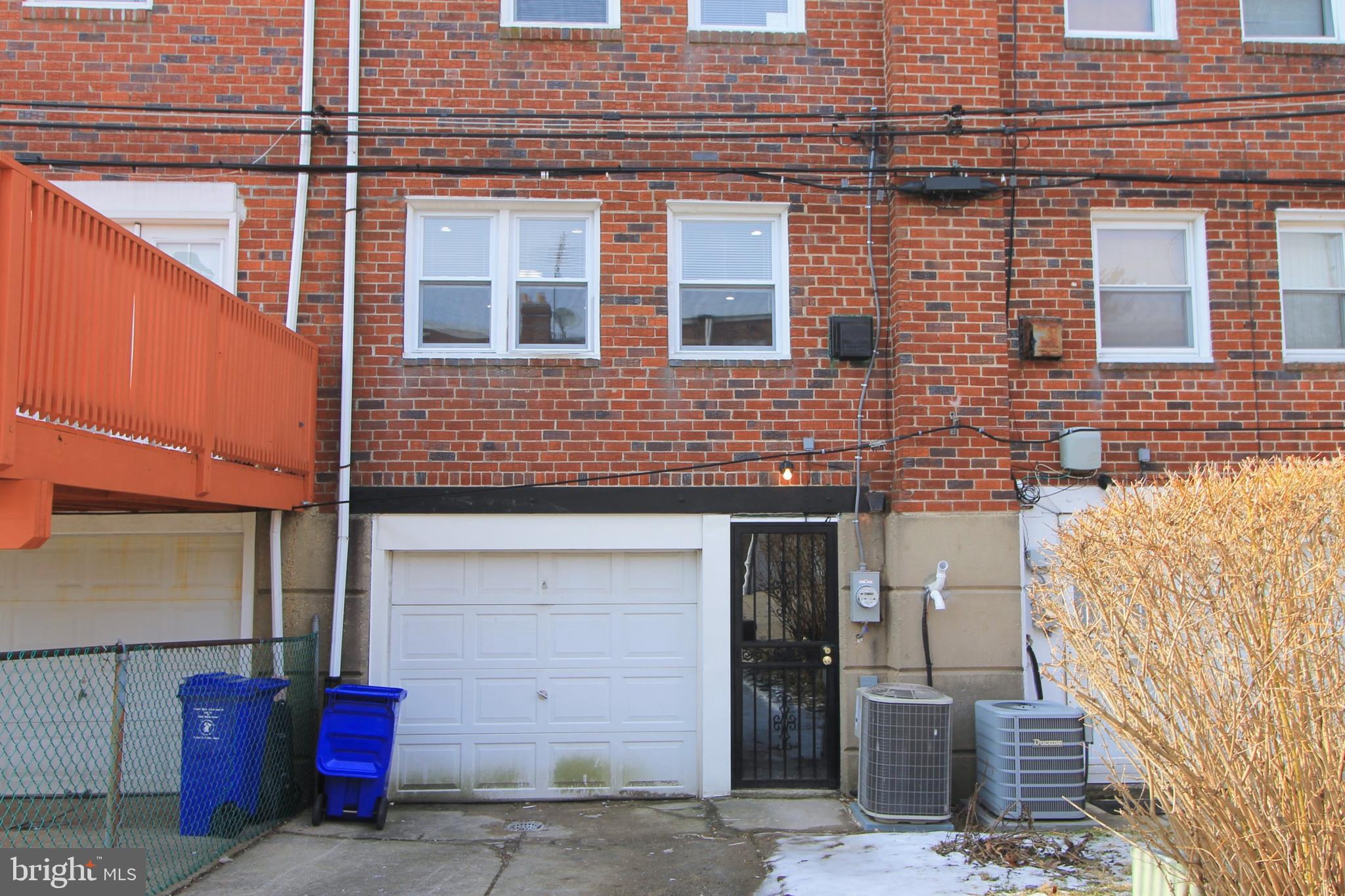 8613 Gilbert Street Philadelphia, PA 19150 - Photo 27 of 28 a view of a brick building with many windows
