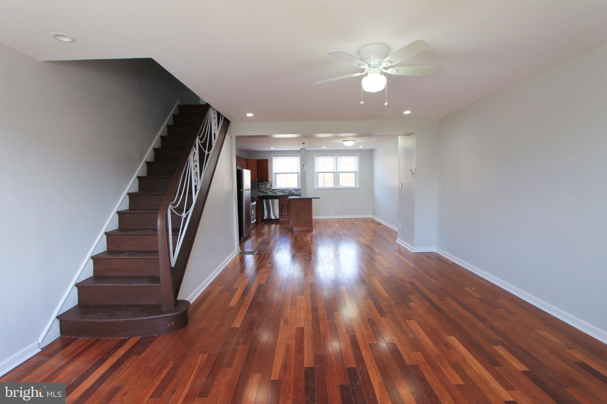 8613 Gilbert Street Philadelphia, PA 19150 - Photo 4 of 28 a view of entryway and hall with wooden floor
