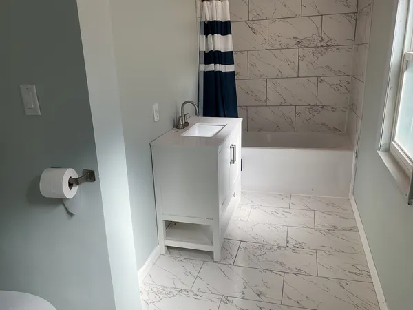a bathroom with a bathtub