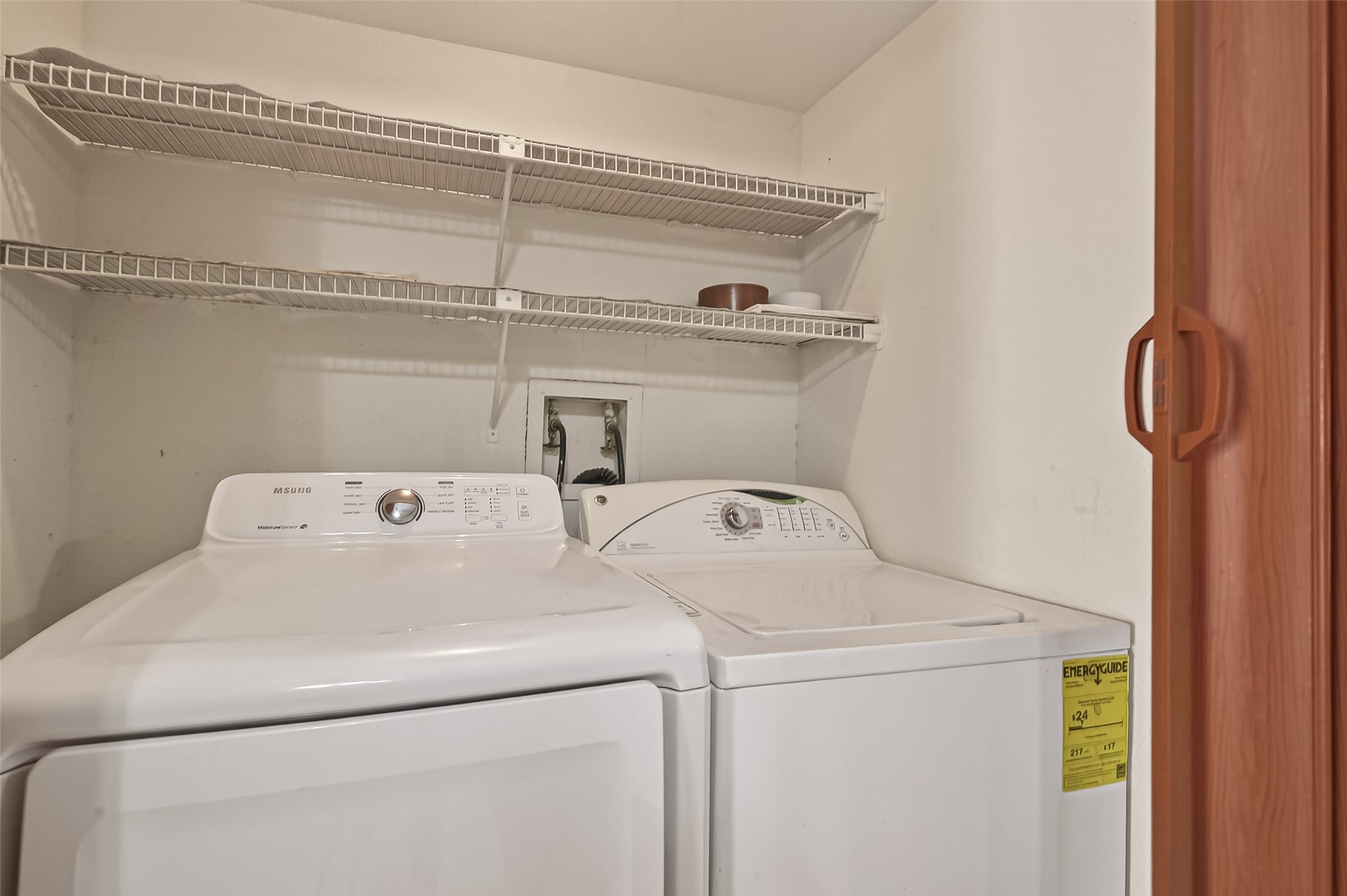 10101 South Gessner Road, Unit 307 Houston, TX 77071 - Photo 6 of 20 a utility room with dryer and washer