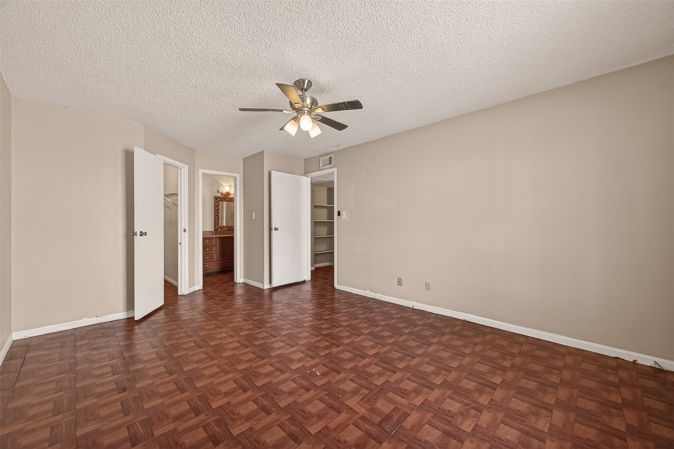 10101 South Gessner Road, Unit 307 Houston, TX 77071 - Photo 10 of 20 wooden floor in an empty room with a window