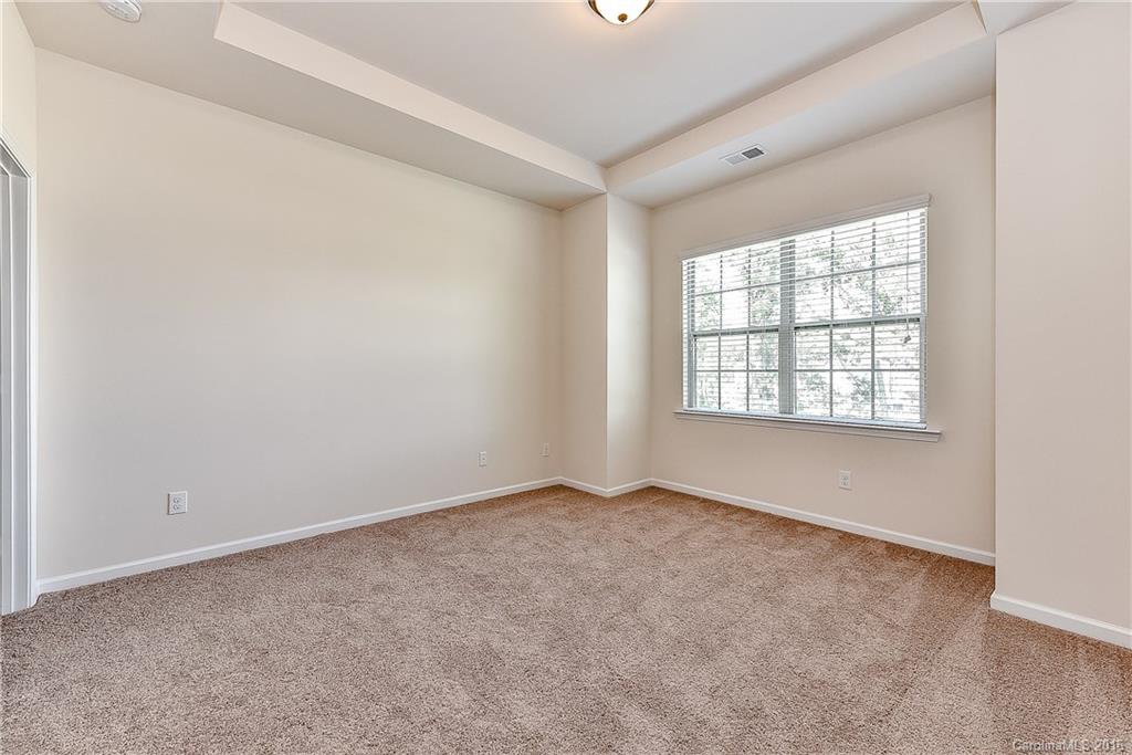 110 Layla Drive, Unit CC180 Tega Cay, SC 29708 - Photo 14 of 23 an empty room with windows
