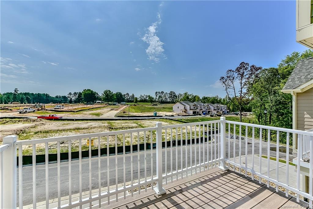 110 Layla Drive, Unit CC180 Tega Cay, SC 29708 - Photo 22 of 23 a view of a balcony with an outdoor seating