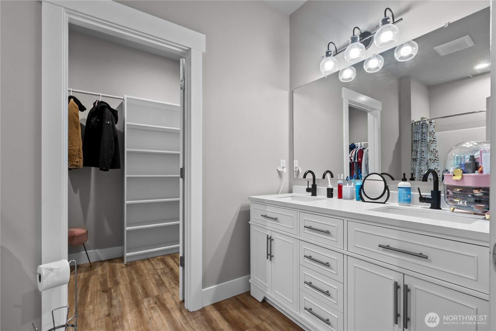 8233 Goldrun Drive Maple Falls, WA 98266 - Photo 13 of 24 a view of bathroom with a light fixture a sink and a mirror