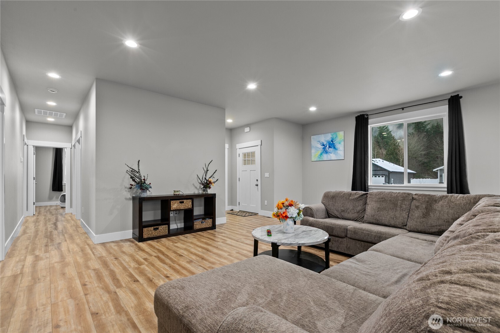 8233 Goldrun Drive Maple Falls, WA 98266 - Photo 6 of 24 a living room with furniture and a wooden floor