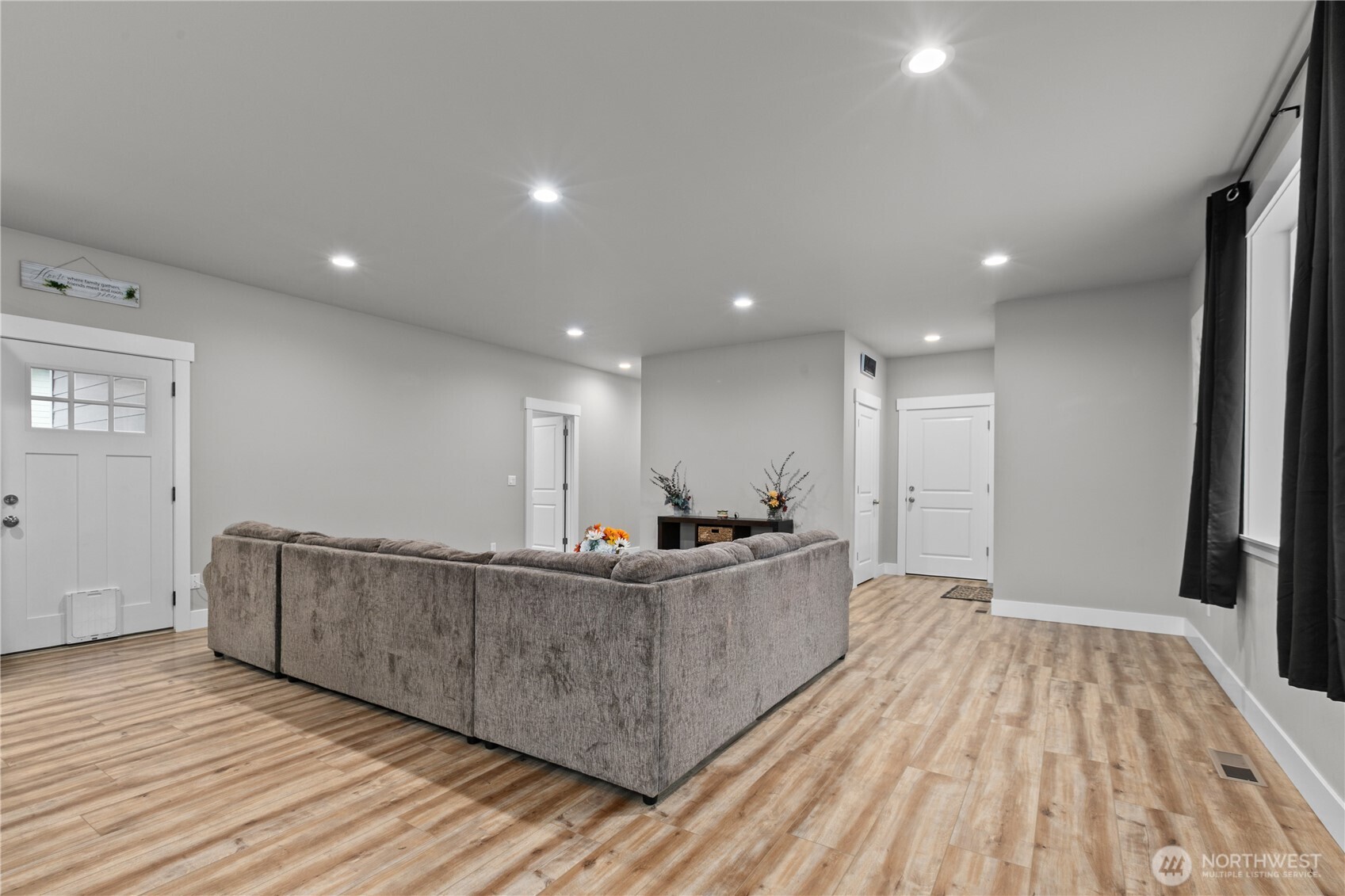 8233 Goldrun Drive Maple Falls, WA 98266 - Photo 7 of 24 a living room with stainless steel appliances kitchen island granite countertop wooden floors and a sink