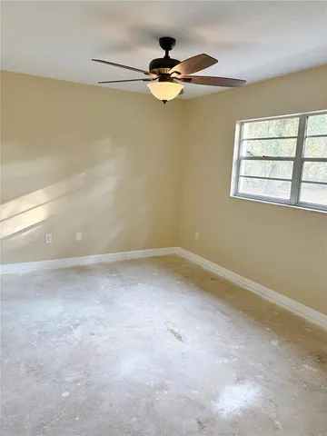 a view of a room with a window