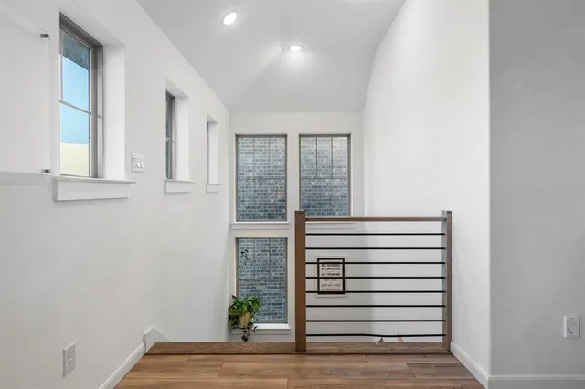 a view of entryway with wooden floor
