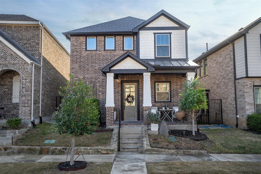 813 Forest Lake Road Flower Mound, TX 75028 - Photo 30 of 39 a front view of a house with garden
