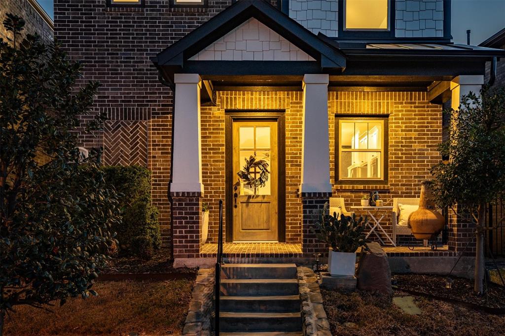 813 Forest Lake Road Flower Mound, TX 75028 - Photo 31 of 39 a front view of a house with a garden