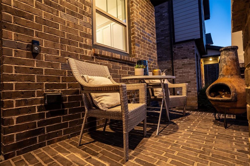 813 Forest Lake Road Flower Mound, TX 75028 - Photo 32 of 39 a view of a chairs and a table in the balcony