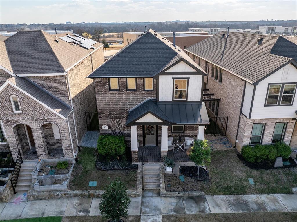 813 Forest Lake Road Flower Mound, TX 75028 - Photo 33 of 39 a front view of a house with garden
