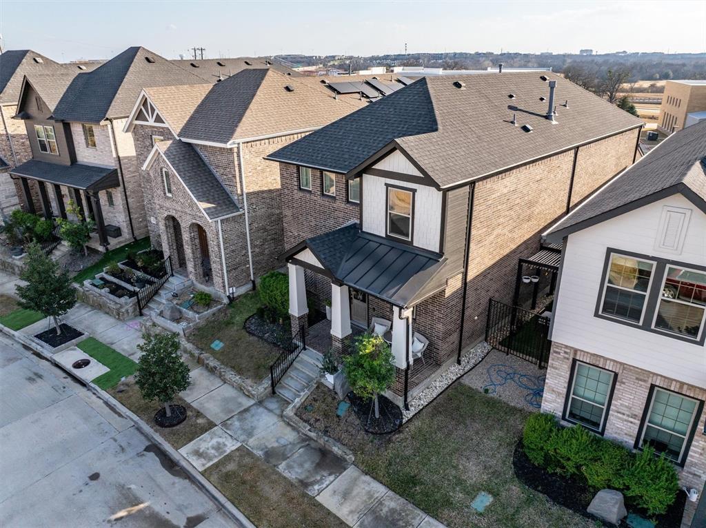 813 Forest Lake Road Flower Mound, TX 75028 - Photo 34 of 39 a aerial view of a brick house next to a yard