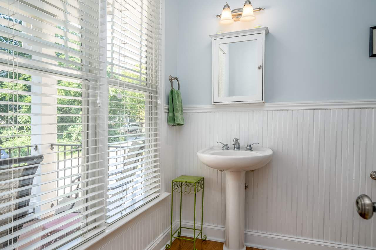 535 Pace Street Raleigh, NC 27604 - Photo 12 of 25 The elegant downstairs powder is large and airy. Powder Room