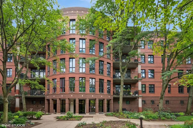 a view of a garden with a house