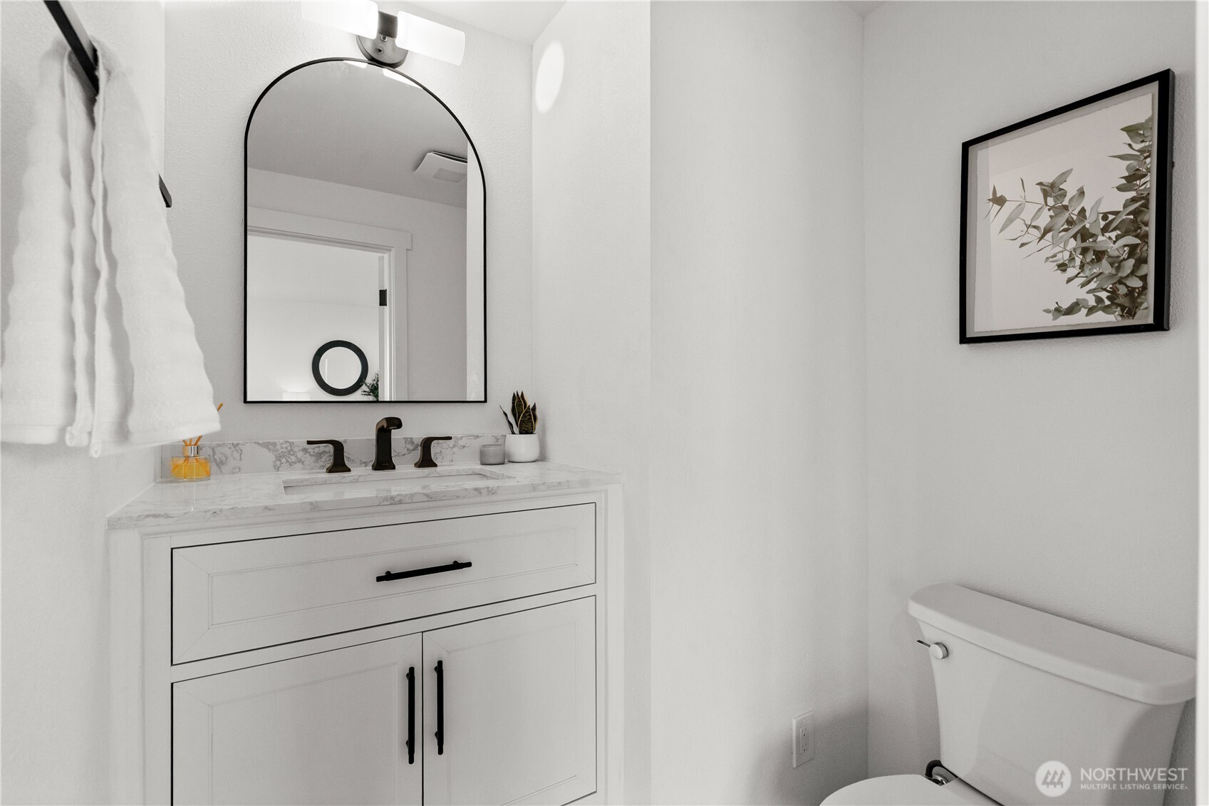 1811 South Stevens Street Seattle, WA 98144 - Photo 12 of 38 a bathroom with a sink mirror vanity and toilet