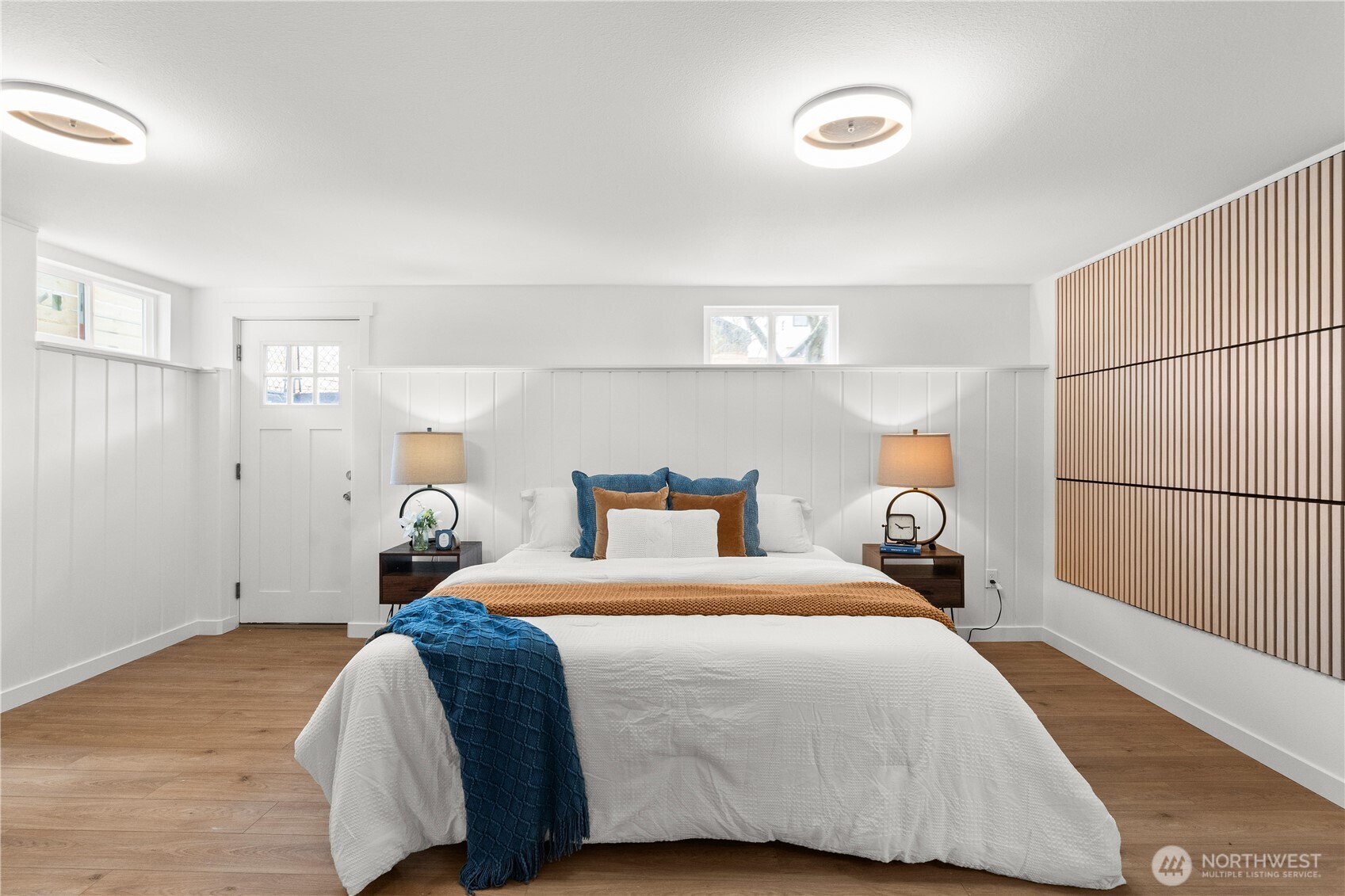 1811 South Stevens Street Seattle, WA 98144 - Photo 29 of 38 a bedroom with a bed and a window