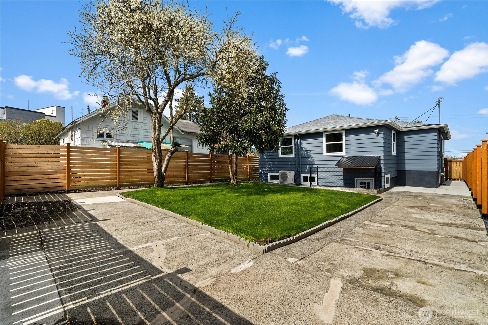 1811 South Stevens Street Seattle, WA 98144 - Photo 33 of 38 a front view of a house with a garden and yard